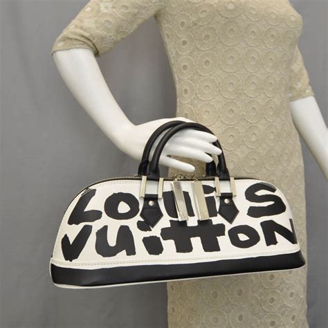 alma graffiti louis vuitton|louis vuitton alma handbag.